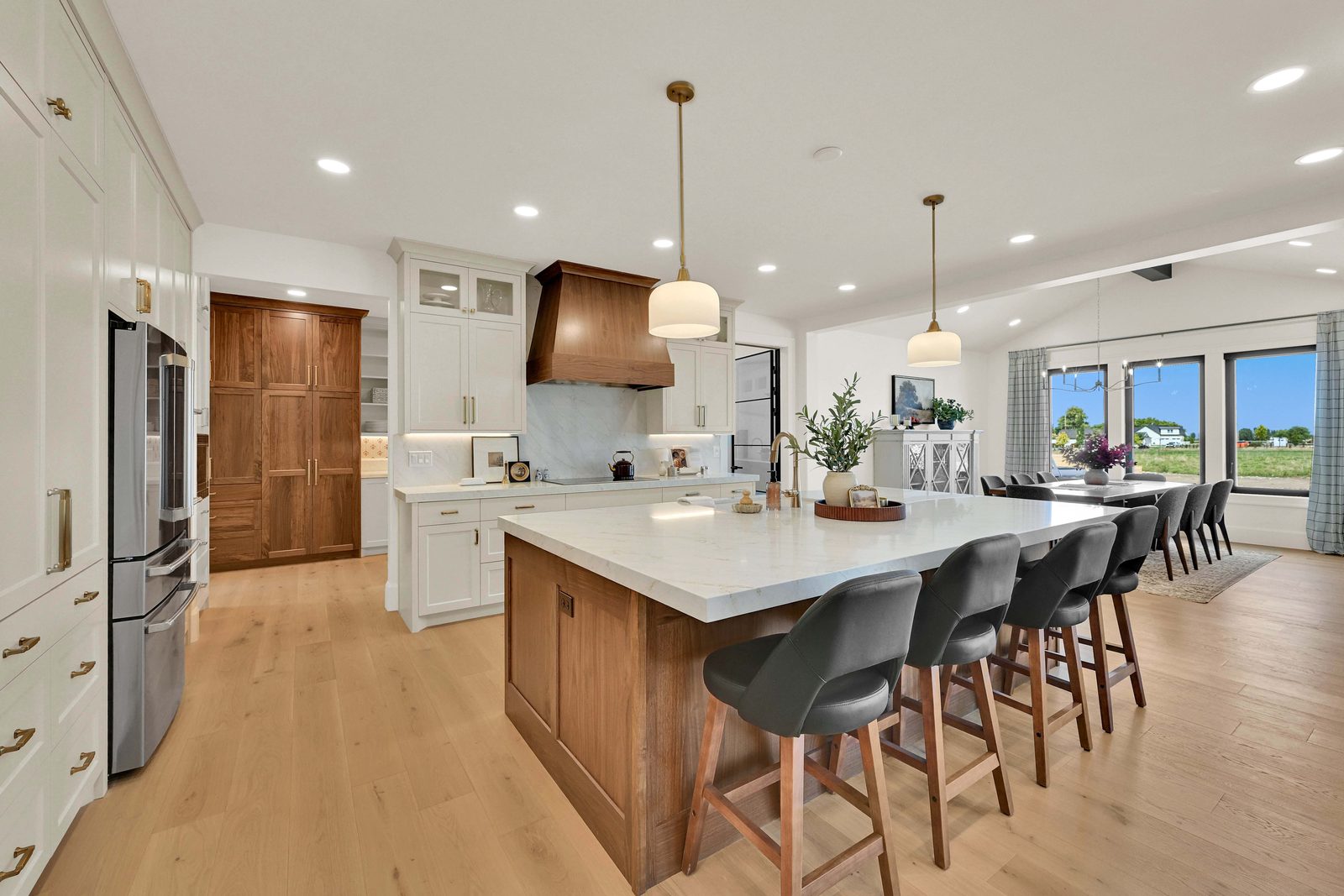 North of Creekside open-concept kitchen and island, 2026 Top of Utah Parade of Homes
