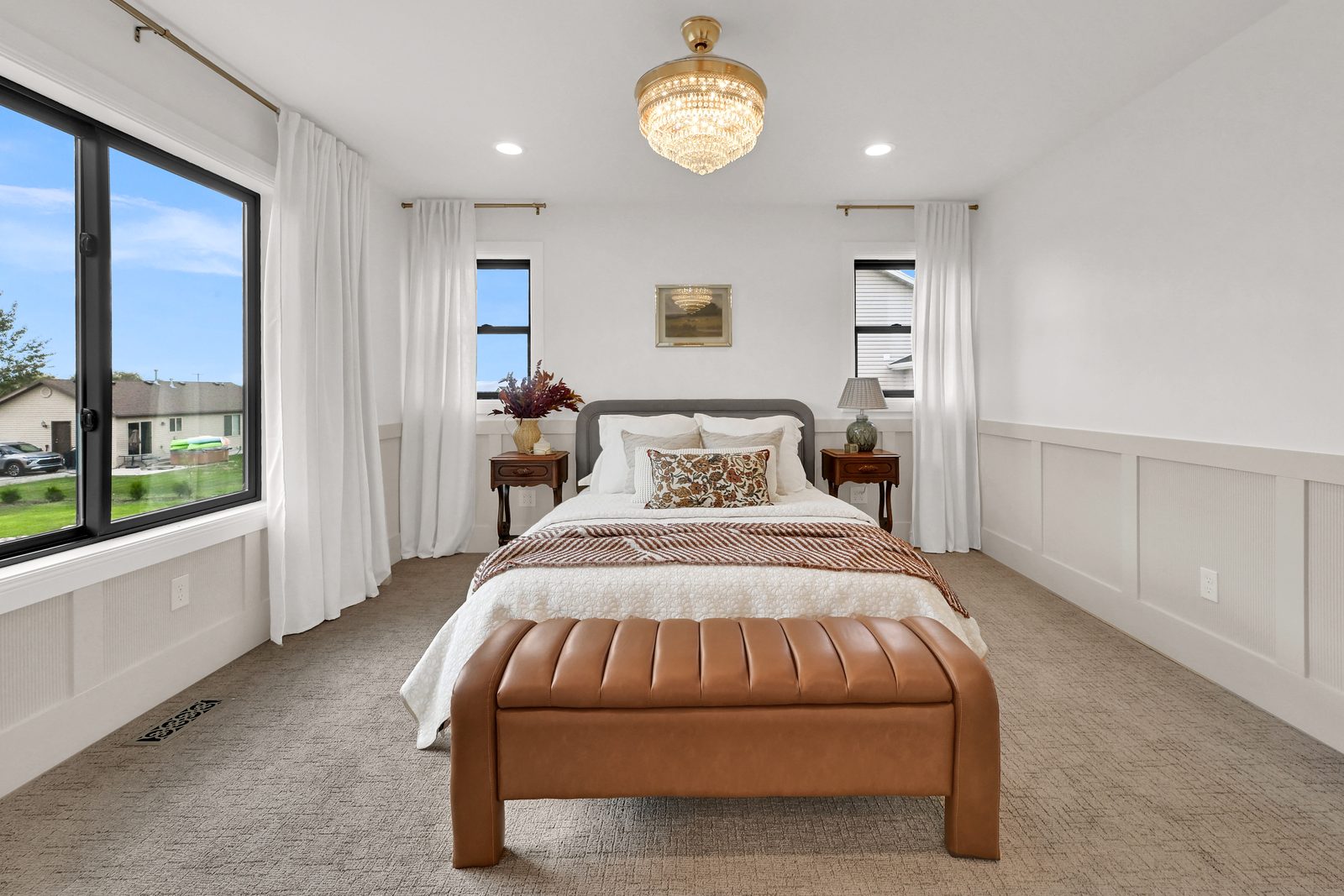 The Lucy primary bedroom with wainscoting, 2025 Top of Utah Parade of Homes